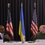 Умеров та Остін