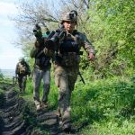 Військові у полі