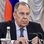 Сергій Лавров за столом на засіданні